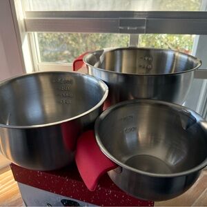 Stainless Steel Mixing Bowls, measuring cups, & spoons with red silicone handles